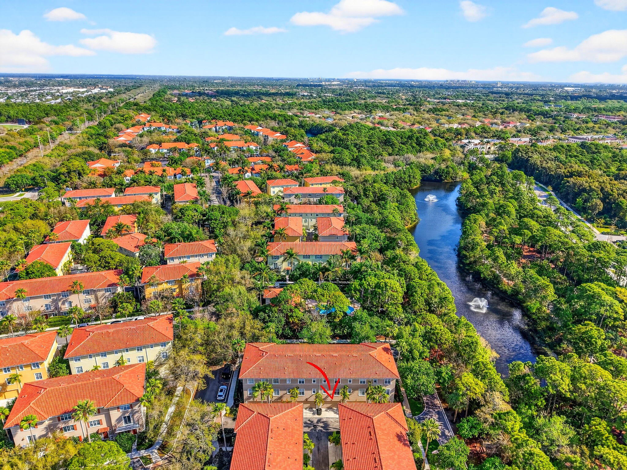 108 Morning Dew Circle Jupiter, FL 33458 - Photo 35 of 46 an aerial view of residential houses with outdoor space and trees