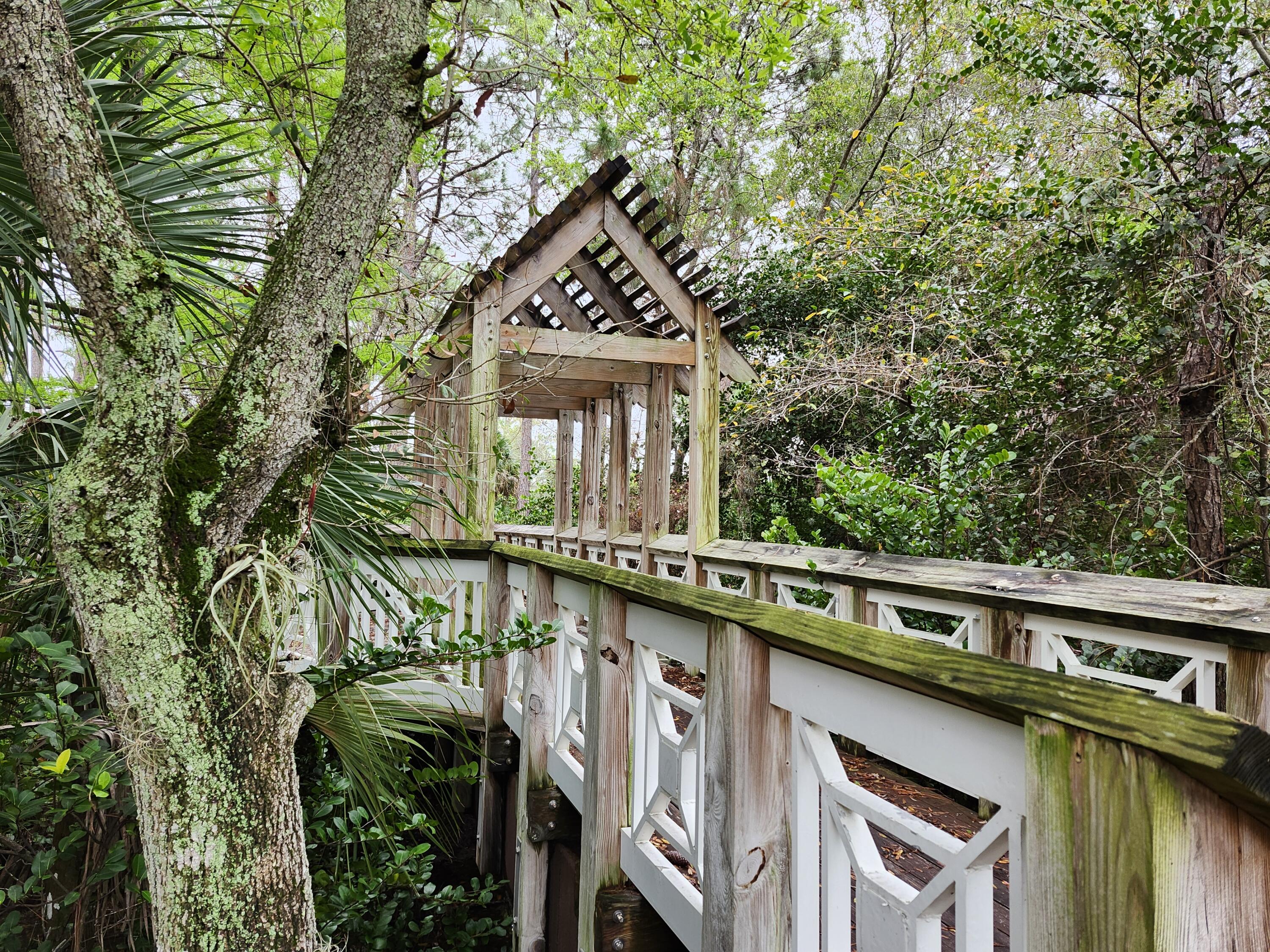 108 Morning Dew Circle Jupiter, FL 33458 - Photo 36 of 46 a front view of a house with garden