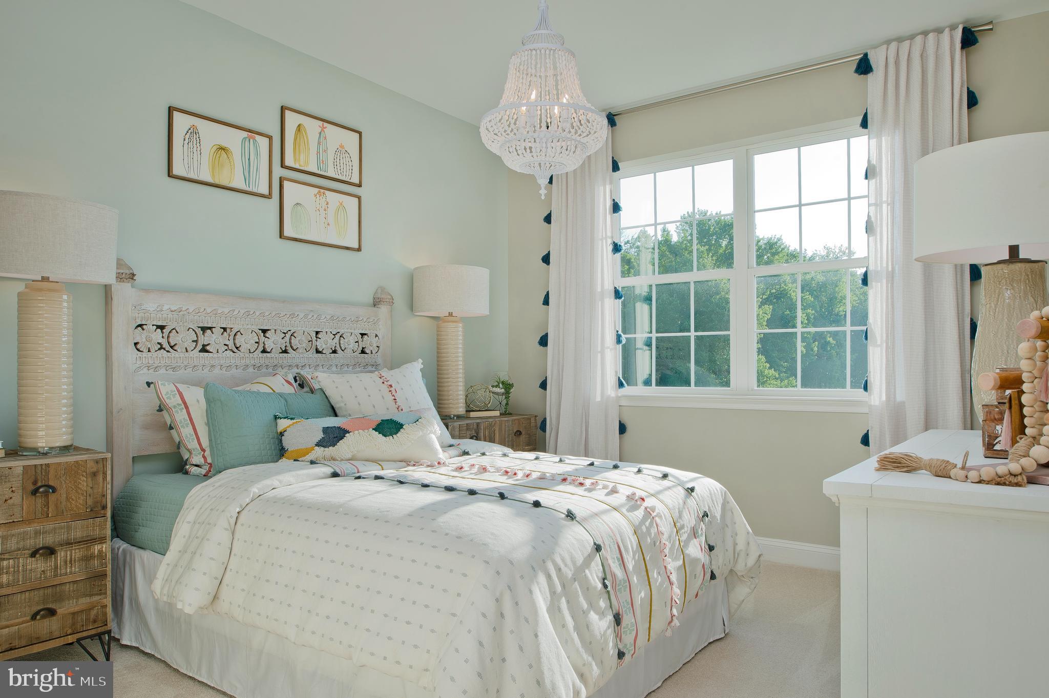 14026 Rolling Pasture Road Boyds, MD 20841 - Photo 15 of 39 a bedroom with a bed and a window