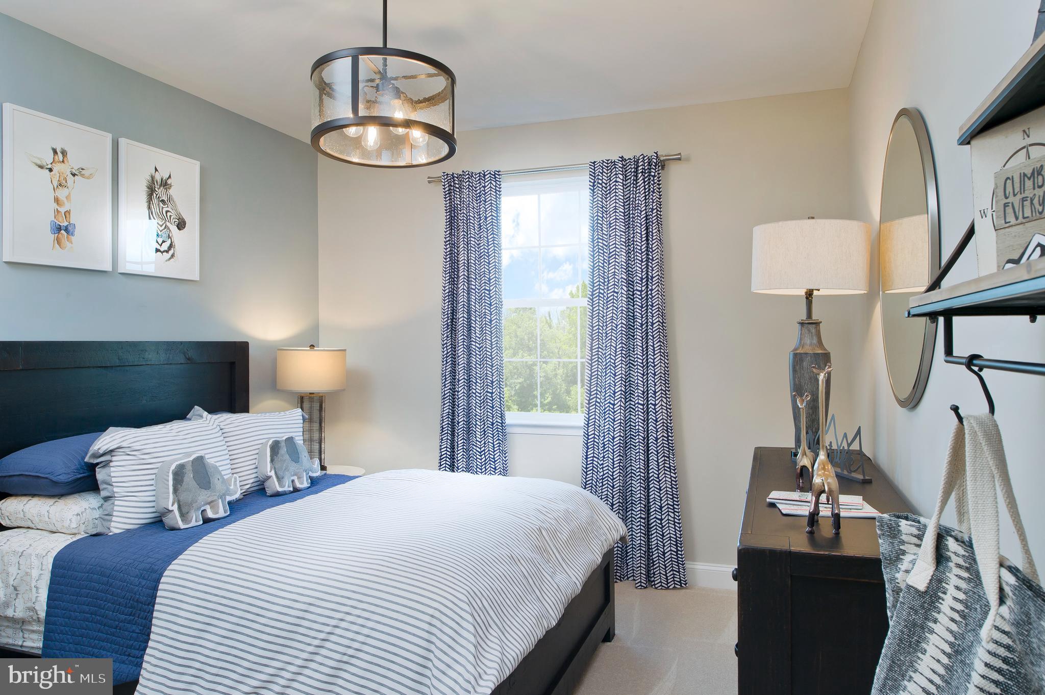 14026 Rolling Pasture Road Boyds, MD 20841 - Photo 19 of 39 a bedroom with bed and a window