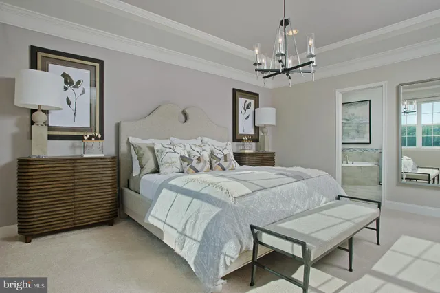 a bathroom with a tub double sink and mirror