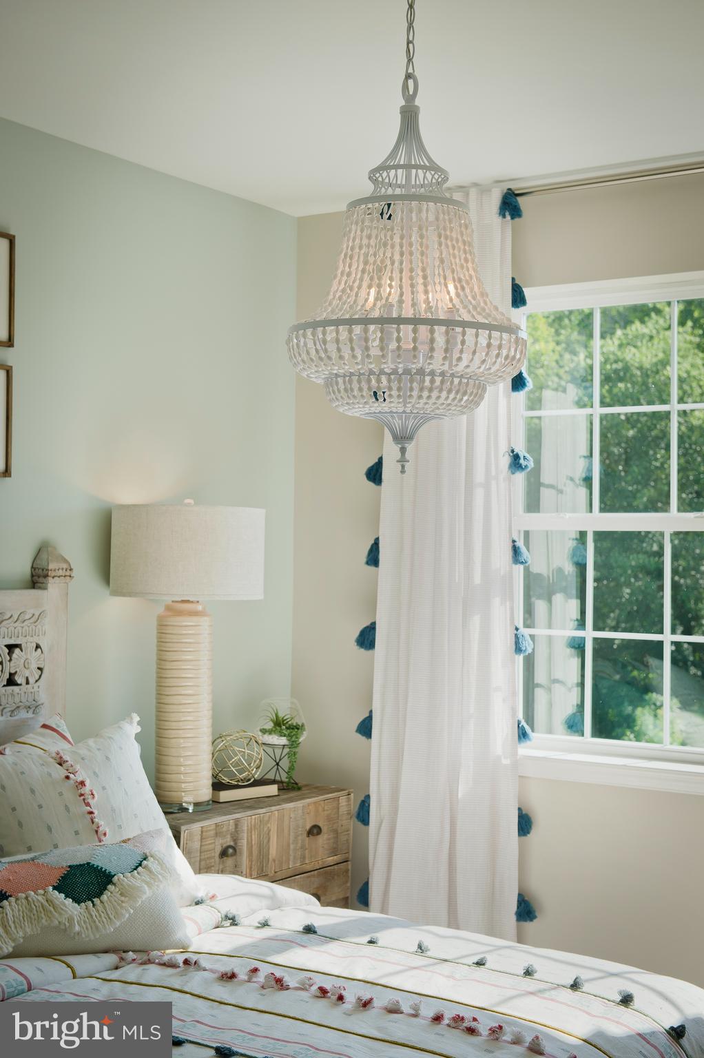14026 Rolling Pasture Road Boyds, MD 20841 - Photo 23 of 39 a vase of flowers sitting on a table