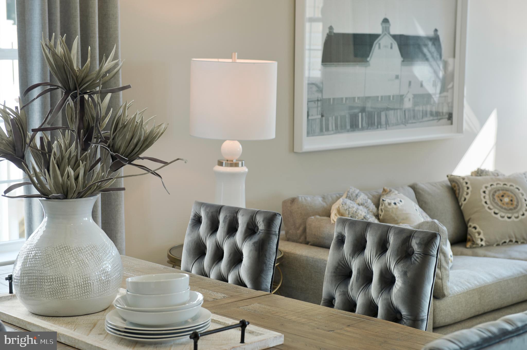 14026 Rolling Pasture Road Boyds, MD 20841 - Photo 28 of 39 a living room with furniture and a potted plant