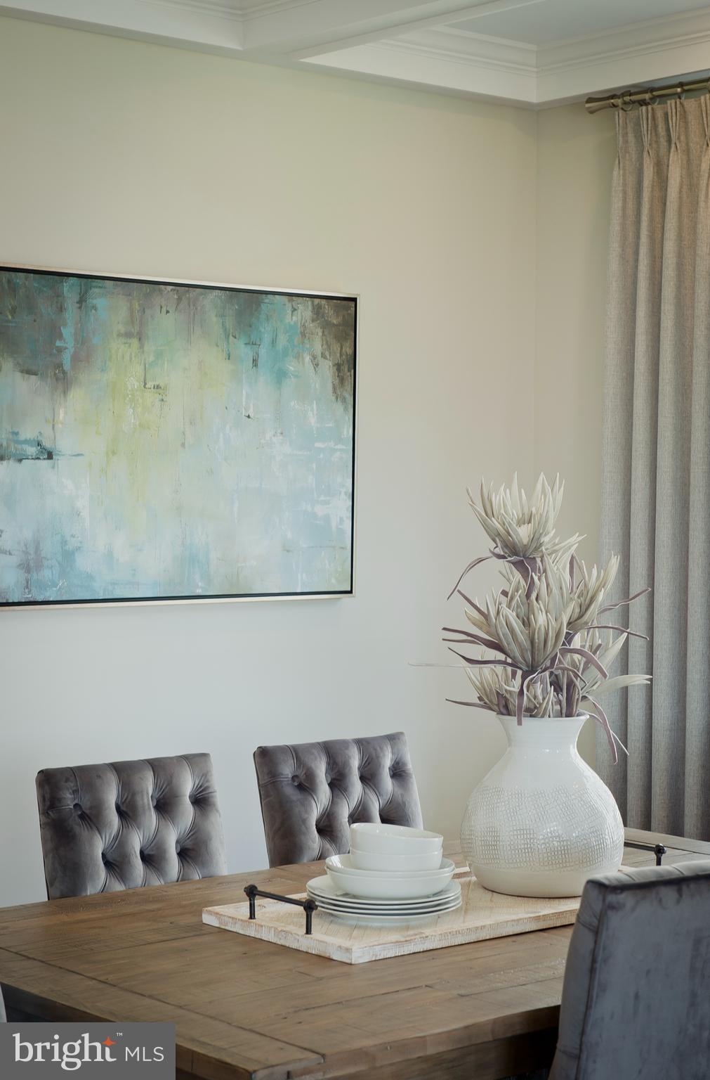 14026 Rolling Pasture Road Boyds, MD 20841 - Photo 30 of 39 a view of a dining room with furniture and wooden floor