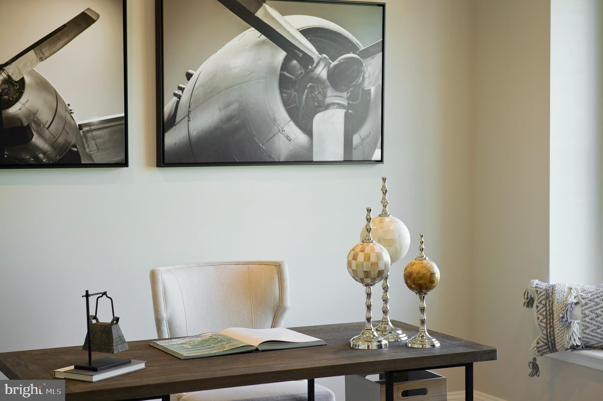 14026 Rolling Pasture Road Boyds, MD 20841 - Photo 3 of 39 a vase of flowers sitting on a table