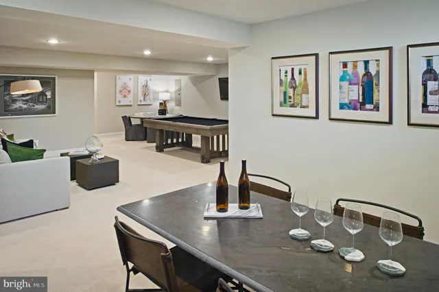 a front view of a residential houses with yard and road