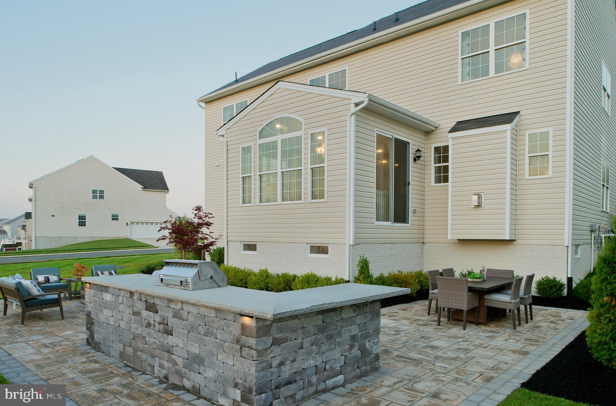 14026 Rolling Pasture Road Boyds, MD 20841 - Photo 35 of 39 a front view of a house with garden