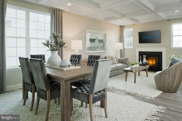 a view of a livingroom with furniture and a fireplace