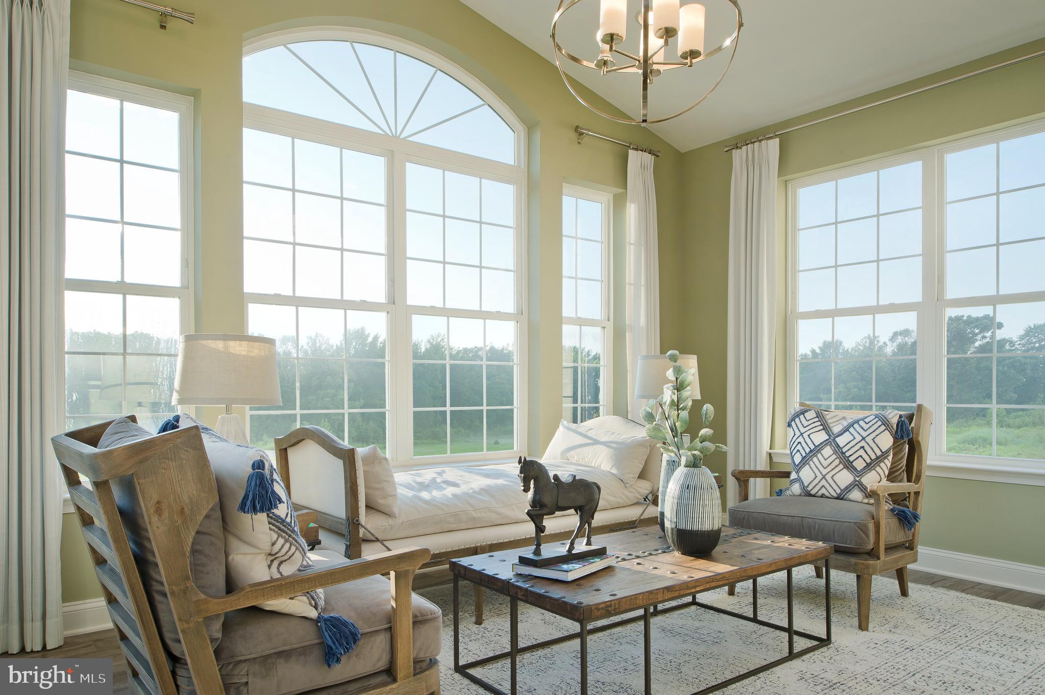 14026 Rolling Pasture Road Boyds, MD 20841 - Photo 8 of 39 a living room with furniture and a large window