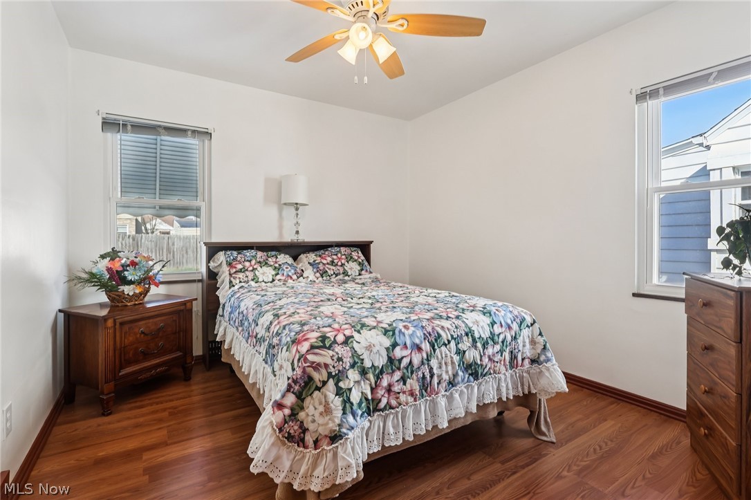 4252 Ridgeview Road Cleveland, OH 44144 - Photo 15 of 37 Bedroom with dark wood finished floors and ceiling fan
