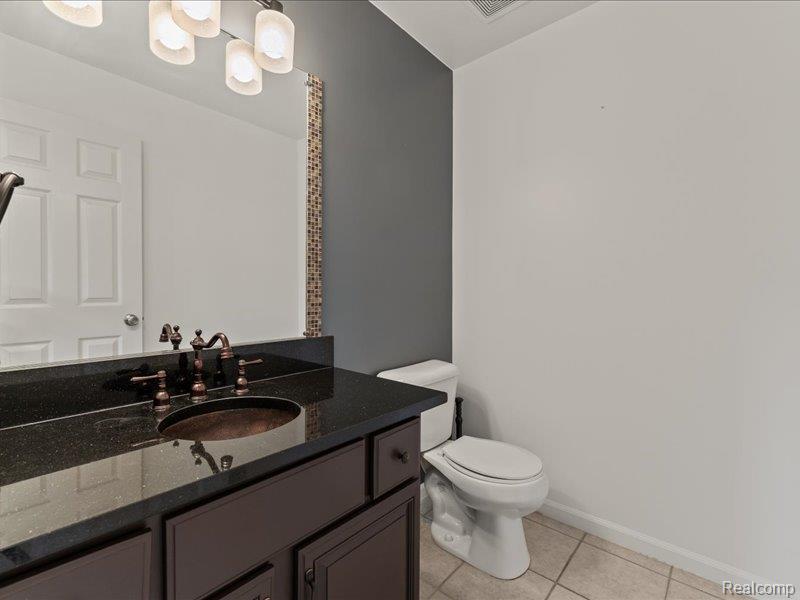 29213 Rachid Lane New Baltimore, MI 48047 - Photo 9 of 26 Bathroom featuring vanity and light tile patterned floors