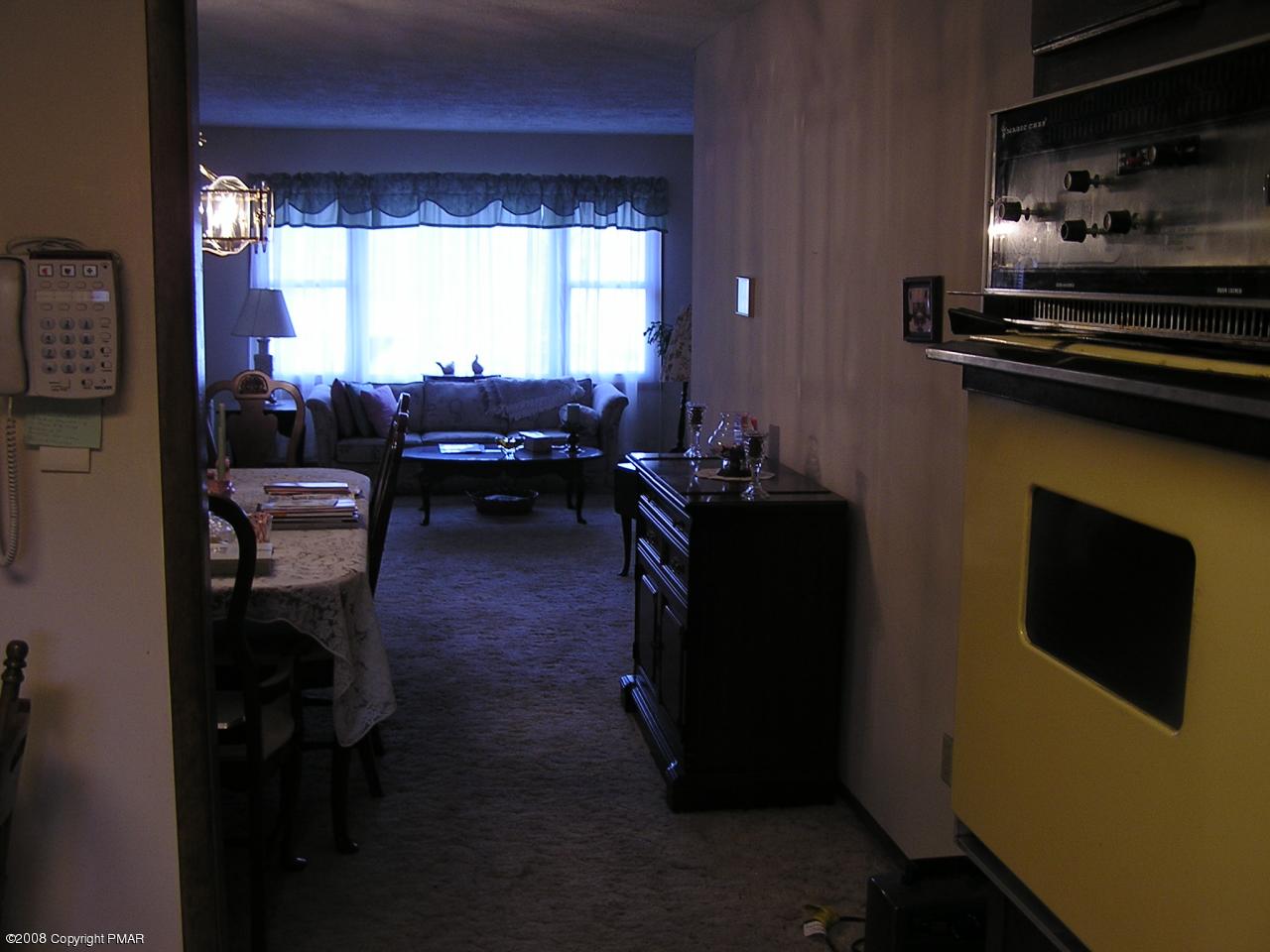 11 Old Post Road Tobyhanna, PA 18466 - Photo 12 of 27 a living room with furniture and a flat screen tv