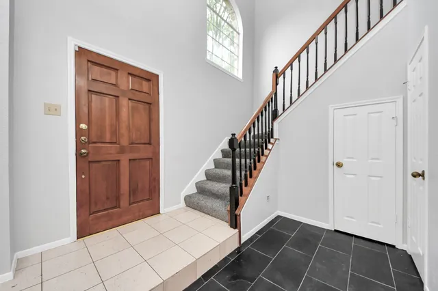 a view of an entryway with staircase