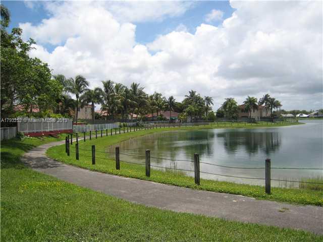9216 Southwest 213th Lane Miami, FL 33189 - Photo 10 of 13 a view of a lake