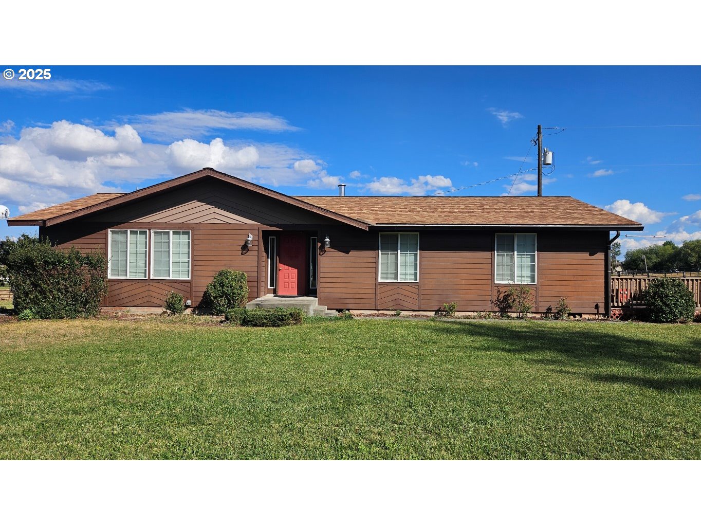 a black and white photo of a house
