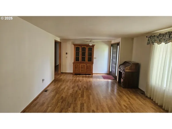 a kitchen with a refrigerator and a sink