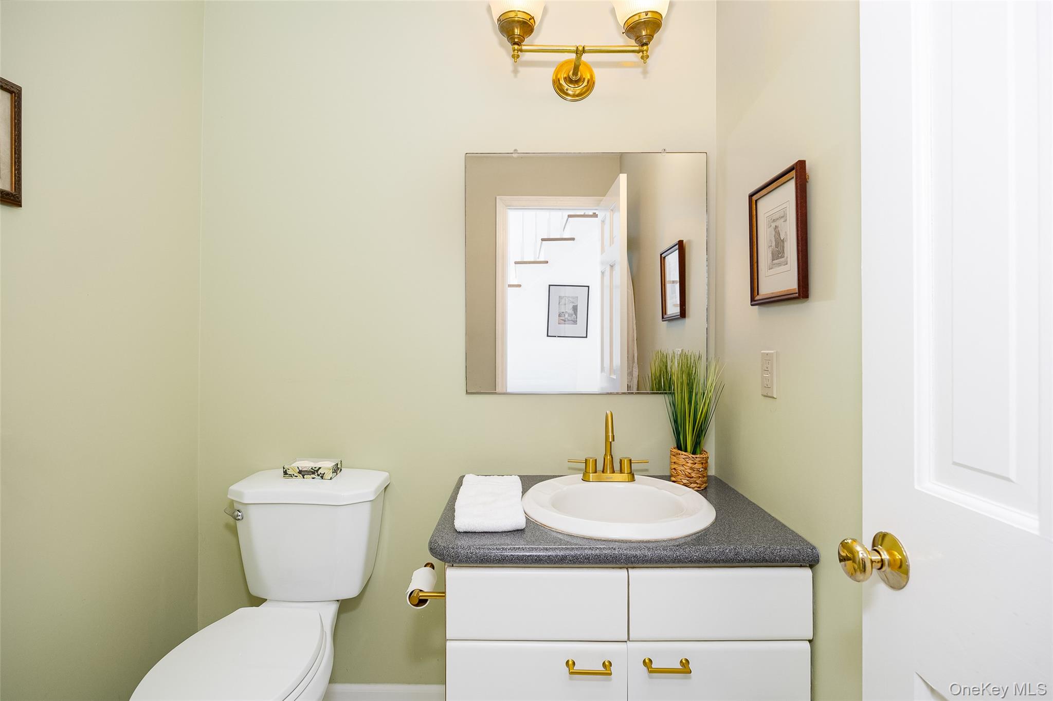 33 Willow Brook Ridge Clinton Corners, NY 12514 - Photo 27 of 50 a bathroom with a granite countertop sink and a mirror