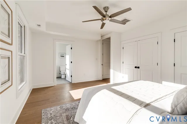 a bathroom with a double vanity sink mirror and