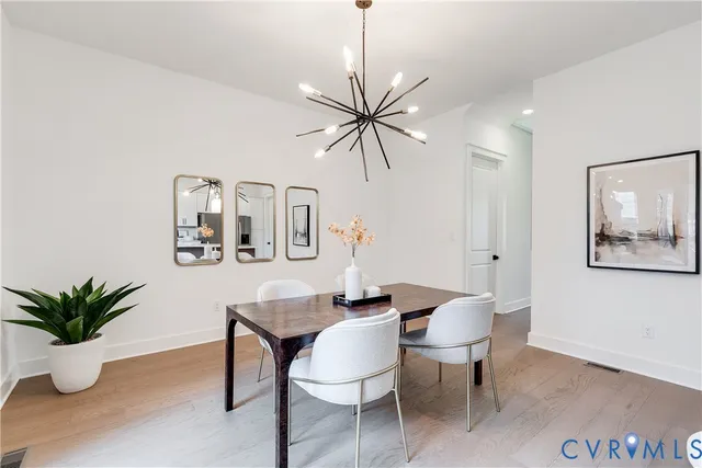a view of a brick house with large windows