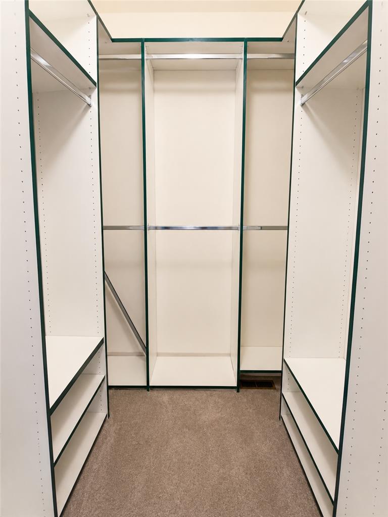 511 Howertown Road Northampton, PA 18067 - Photo 18 of 34 Custom shelving and hanging space in this generously sized closet optimize organization.