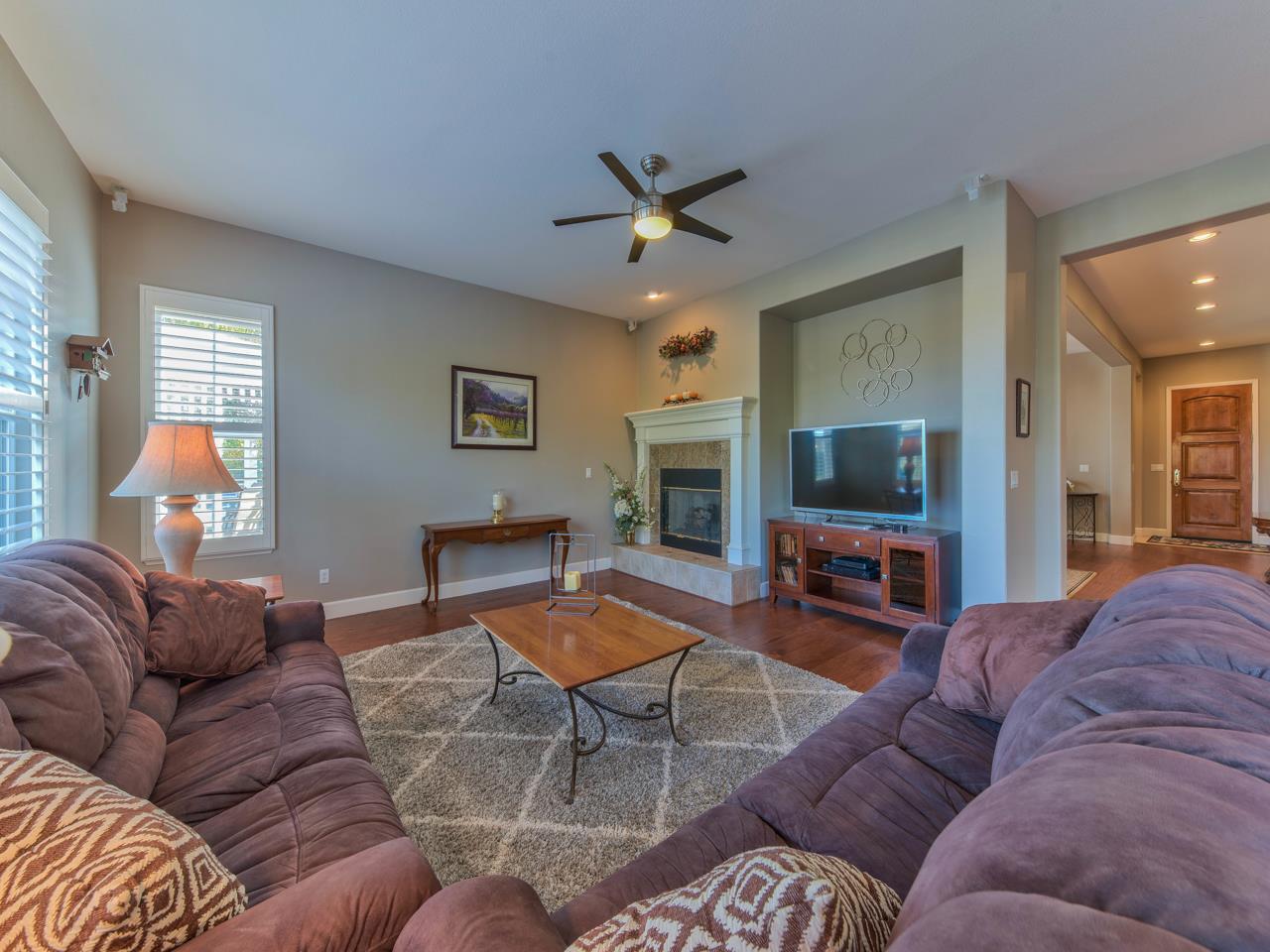 1975 Killarney Court Gilroy, CA 95020 - Photo 19 of 64 a living room with furniture a flat screen tv and a window