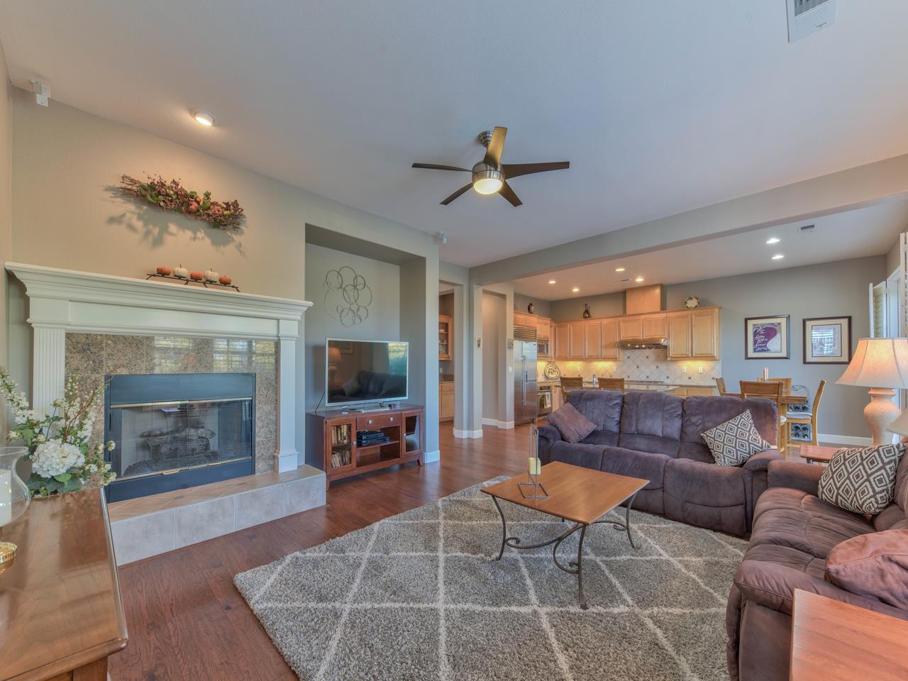 1975 Killarney Court Gilroy, CA 95020 - Photo 21 of 64 a living room with furniture a fireplace and a flat screen tv