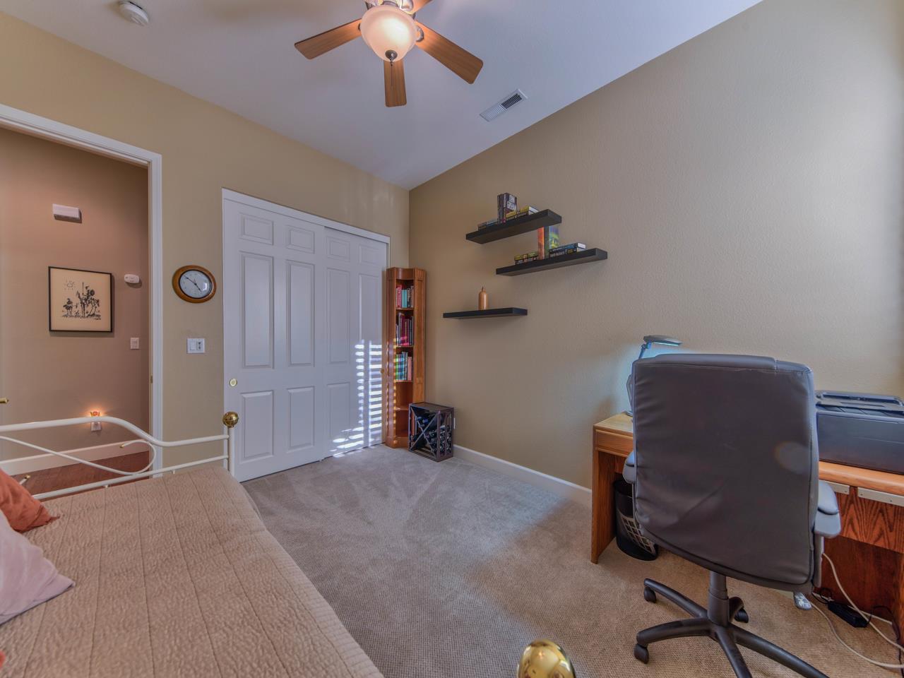 1975 Killarney Court Gilroy, CA 95020 - Photo 31 of 64 a view of a workspace with furniture and a ceiling fan