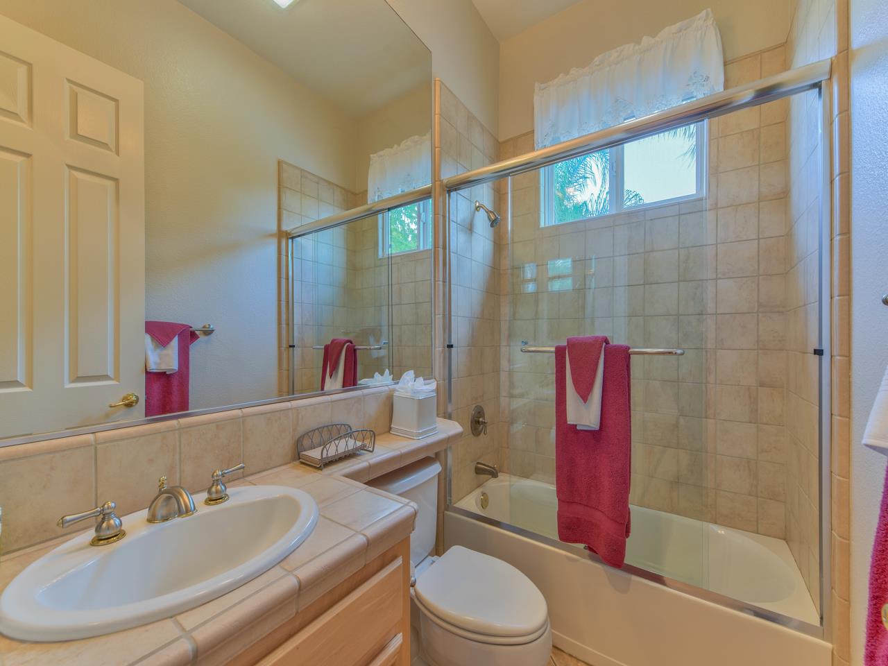 1975 Killarney Court Gilroy, CA 95020 - Photo 35 of 64 a bathroom with a sink a toilet and shower