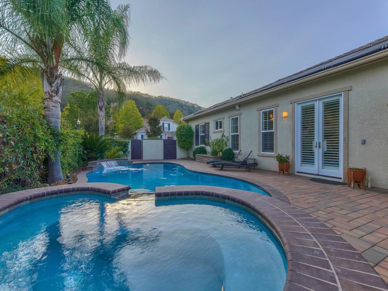 1975 Killarney Court Gilroy, CA 95020 - Photo 38 of 64 a swimming pool with outdoor seating and yard