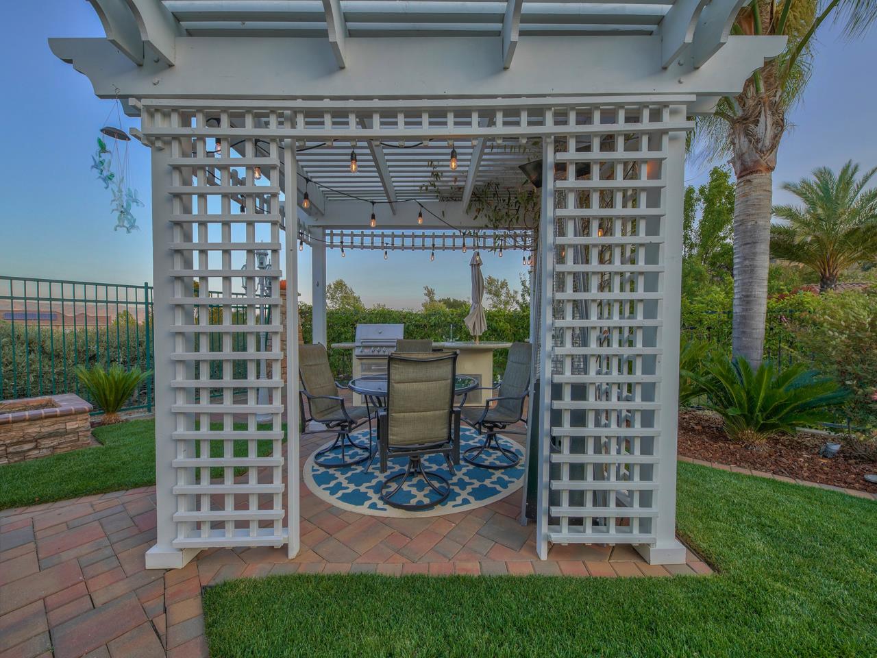 1975 Killarney Court Gilroy, CA 95020 - Photo 42 of 64 a view of a chair and table in backyard of the house