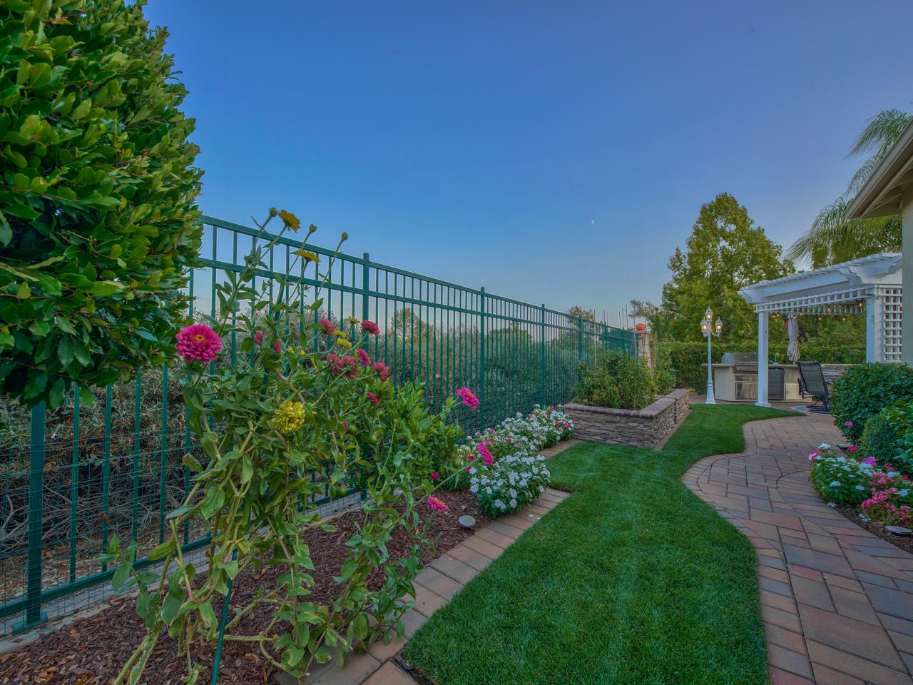 1975 Killarney Court Gilroy, CA 95020 - Photo 46 of 64 a view of a potted flower in a yard with swimming pool