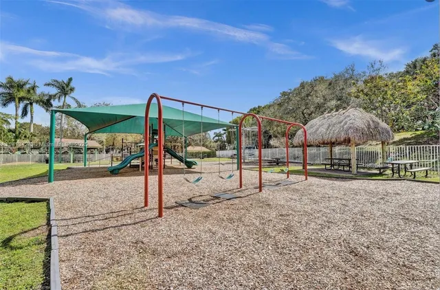 a view of a park with slide