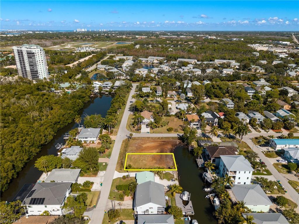 1292 Venetian Way Naples, FL 34110 - Photo 17 of 35 an aerial view of residential houses with outdoor space