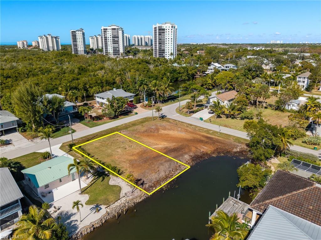 1292 Venetian Way Naples, FL 34110 - Photo 29 of 35 a view of a tennis court