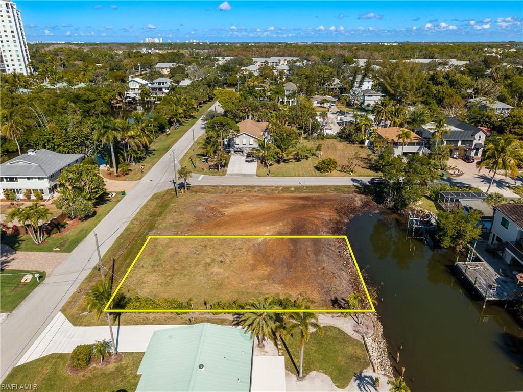 1292 Venetian Way Naples, FL 34110 - Photo 31 of 35 an aerial view of residential houses with outdoor space