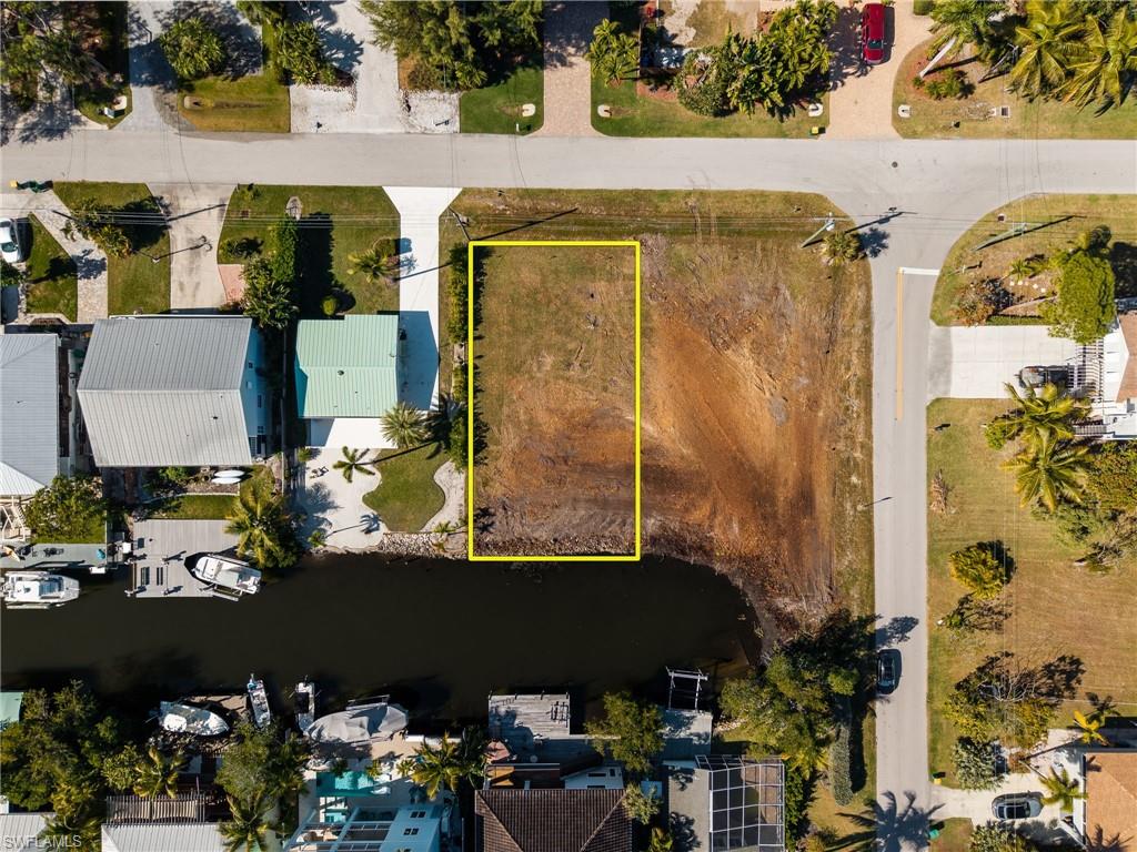 1292 Venetian Way Naples, FL 34110 - Photo 33 of 35 an aerial view of houses with outdoor space