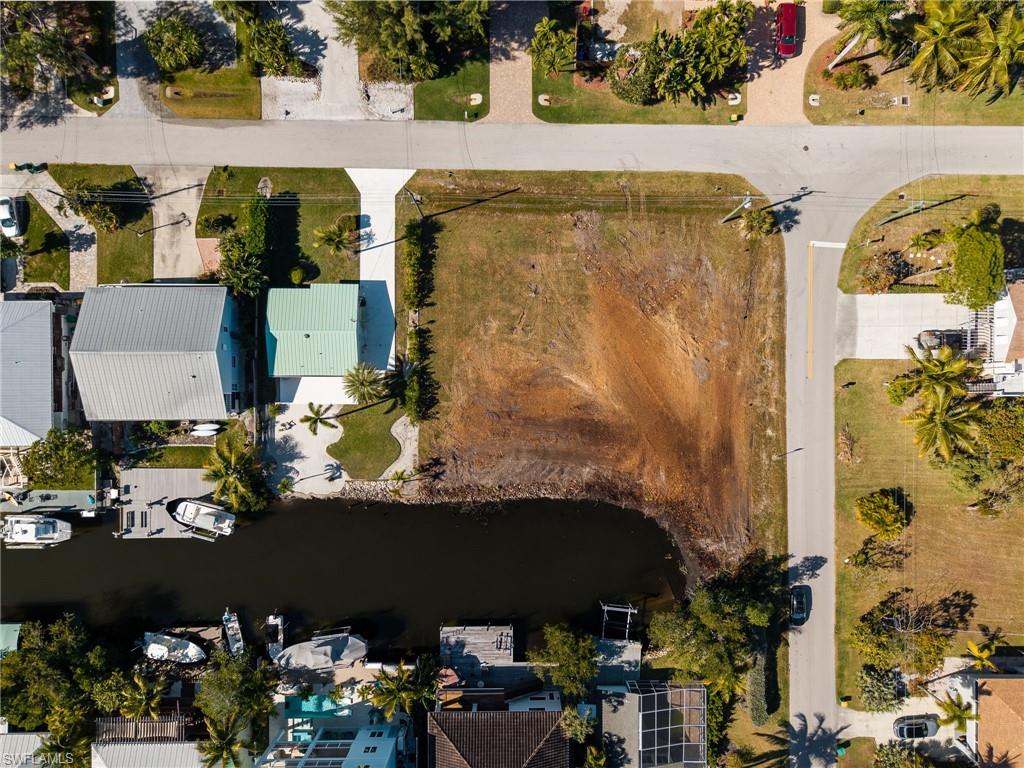 1292 Venetian Way Naples, FL 34110 - Photo 34 of 35 an aerial view of houses with outdoor space