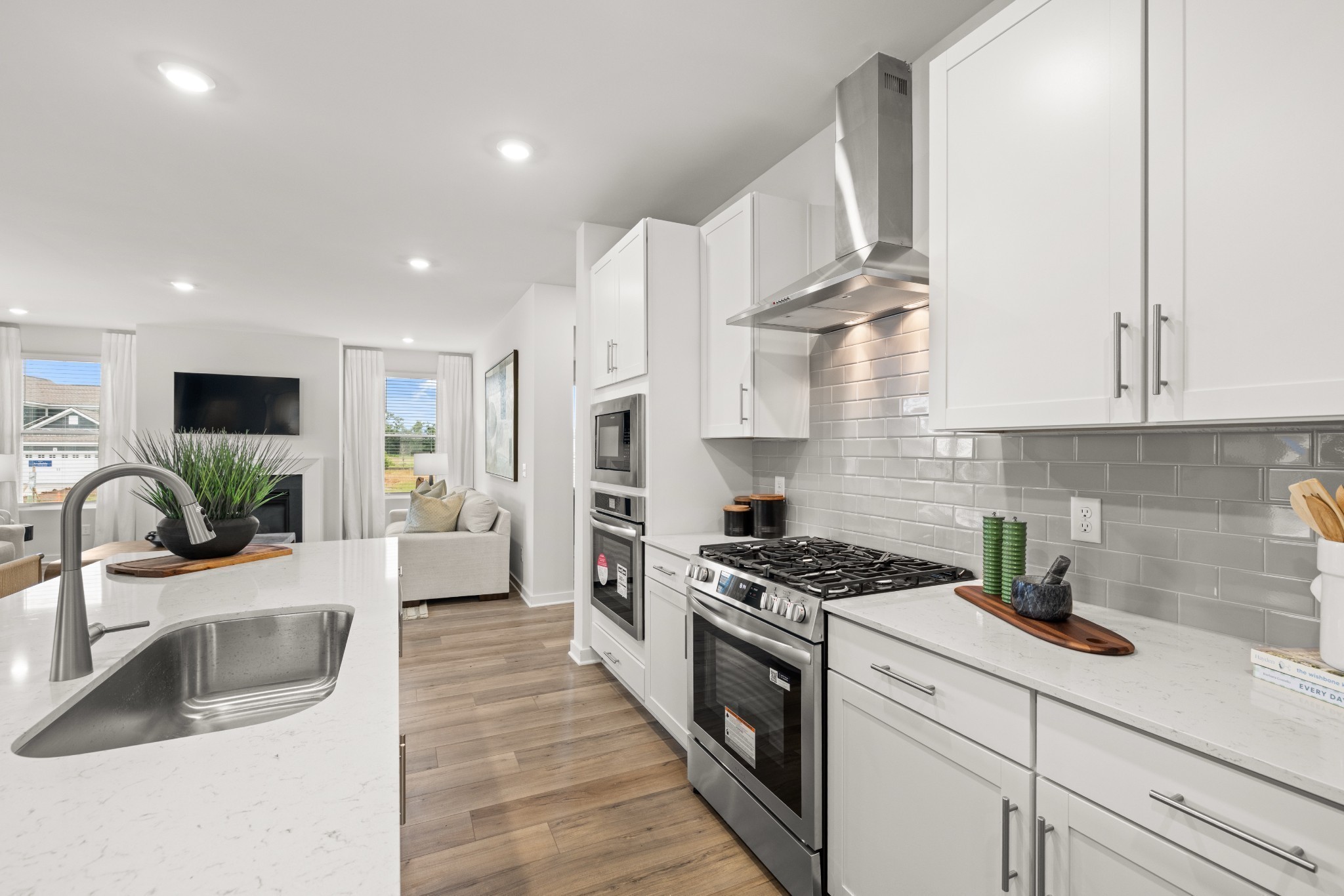6370 North New Hope Road Hermitage, TN 37076 - Photo 14 of 84 a kitchen with granite countertop a sink stainless steel appliances and cabinets