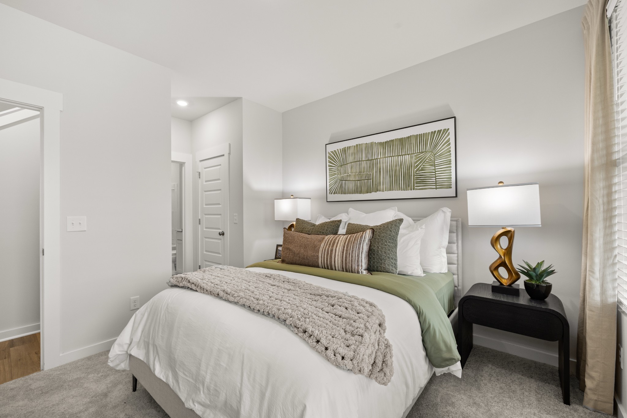 6370 North New Hope Road Hermitage, TN 37076 - Photo 32 of 84 a bed room with a bed and a painting