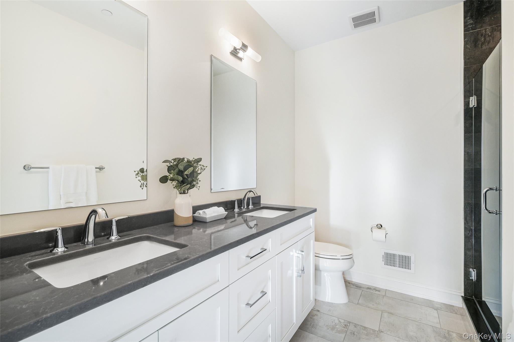 2040 Crompond Road, Unit 12 Yorktown Heights, NY 10598 - Photo 15 of 29 a bathroom with a granite countertop sink and a mirror