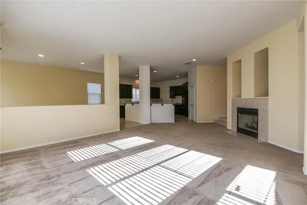 a view of a livingroom with a fireplace