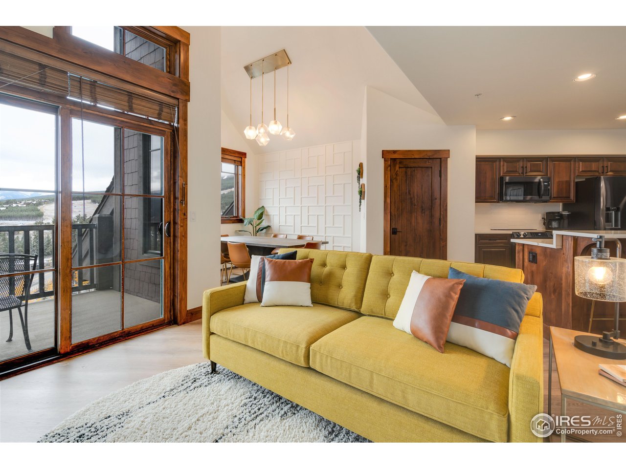 1891 Ski Hill Road, Unit 7408 Breckenridge, CO 80424 - Photo 19 of 30 a view of living room kitchen and a large window