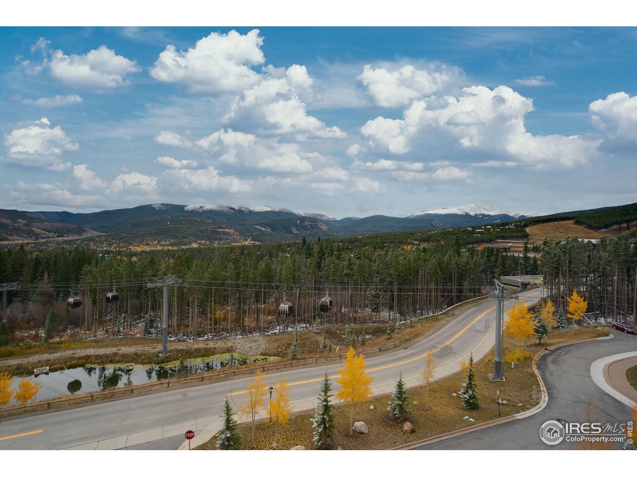 1891 Ski Hill Road, Unit 7408 Breckenridge, CO 80424 - Photo 21 of 30 a view of swimming pool with a lake view