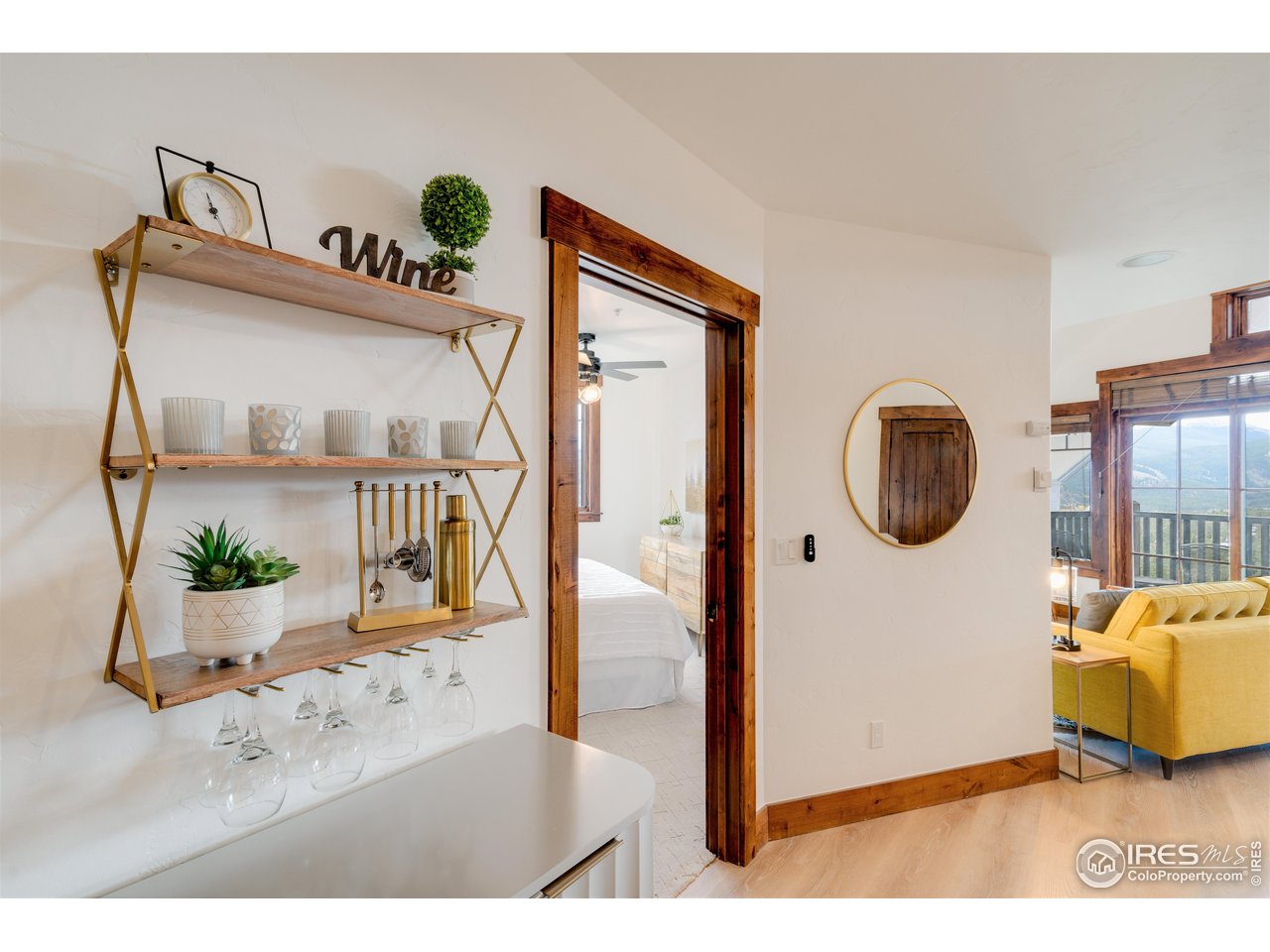 1891 Ski Hill Road, Unit 7408 Breckenridge, CO 80424 - Photo 8 of 30 a living room with furniture and a wooden floor