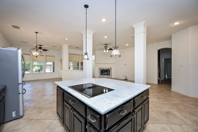 a view of a livingroom with furniture and a window