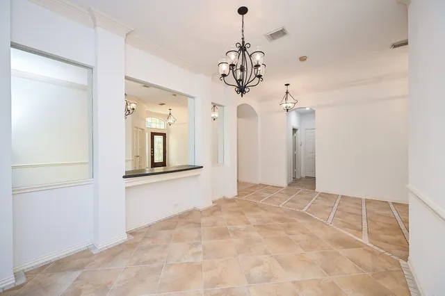 a kitchen with stainless steel appliances granite countertop a sink stove and microwave