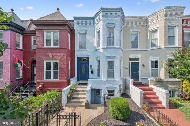 a front view of a multi story residential apartment building
