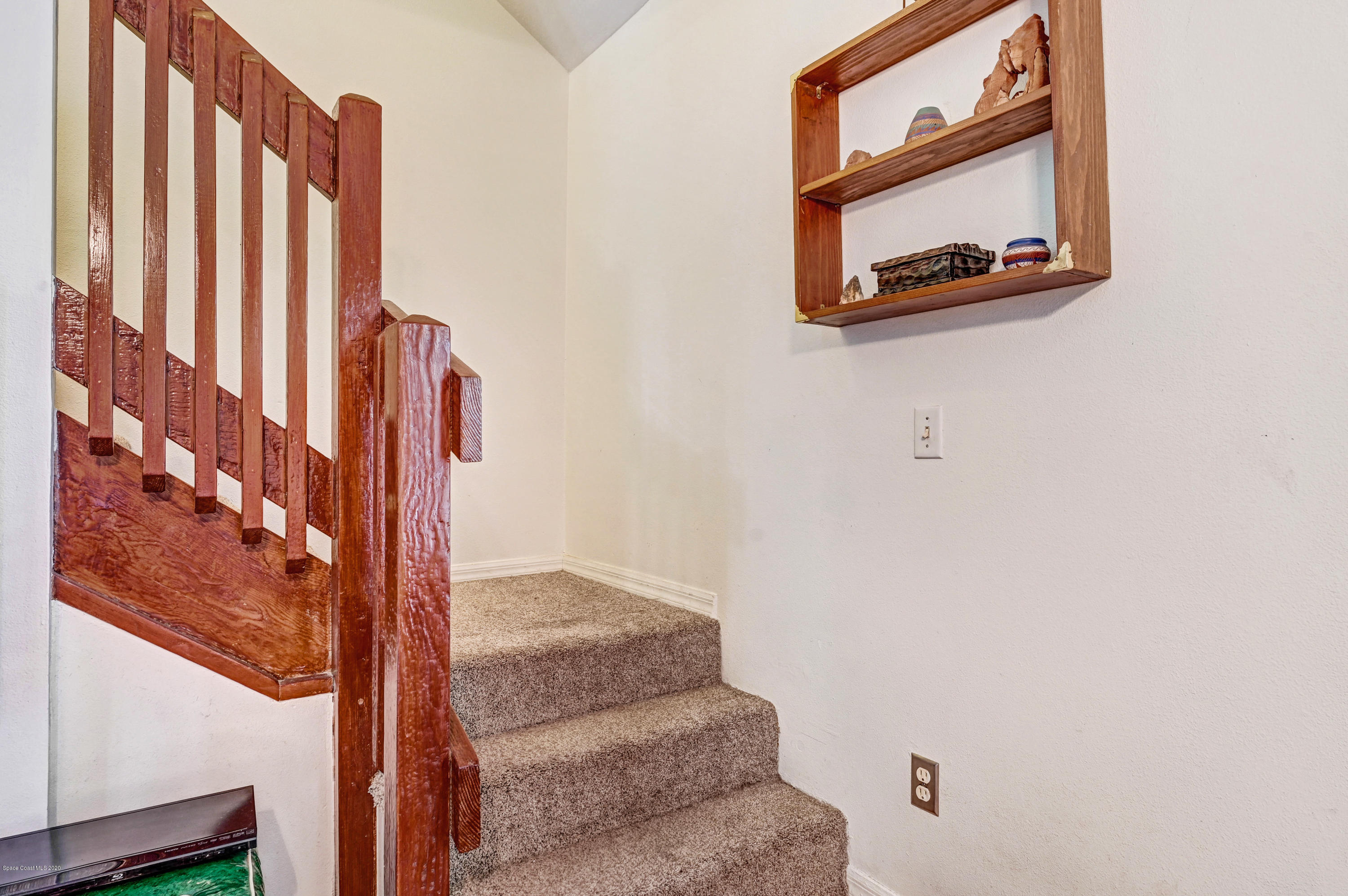 2334 Ravel Road Southeast Palm Bay, FL 32909 - Photo 15 of 34 Newly Carpeted Stairs