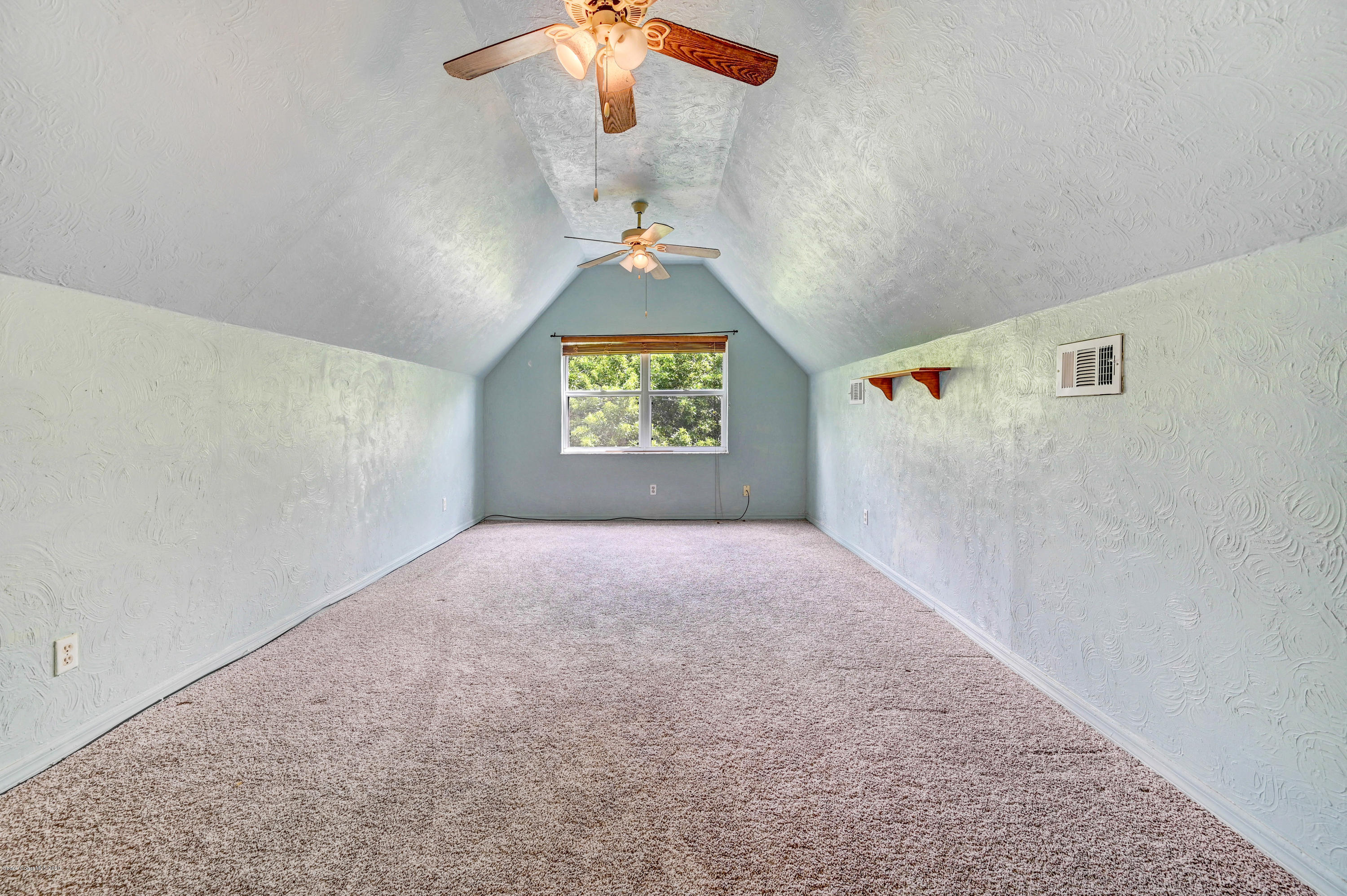 2334 Ravel Road Southeast Palm Bay, FL 32909 - Photo 23 of 34 Newly Carpeted Bonus Room