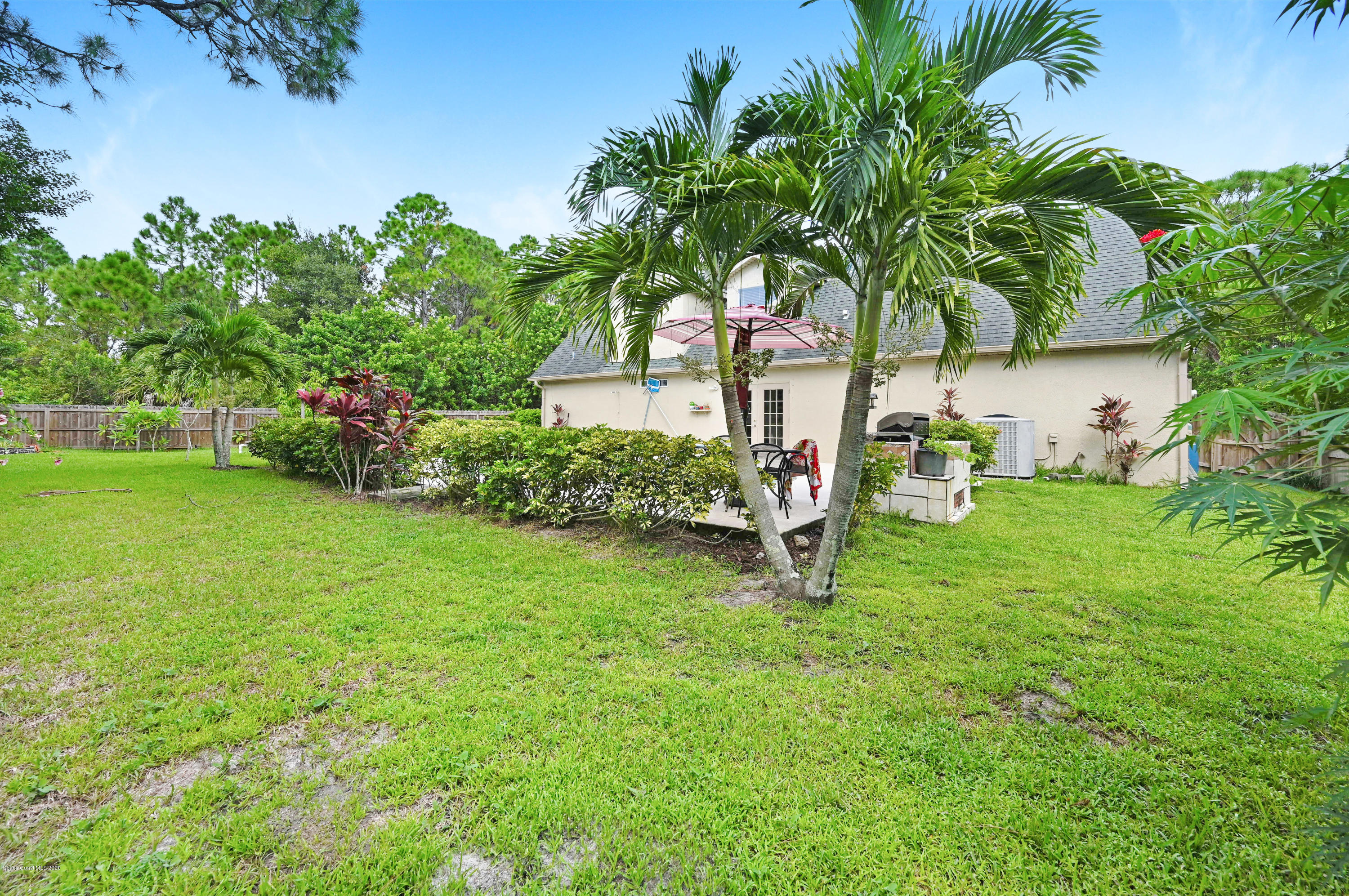 2334 Ravel Road Southeast Palm Bay, FL 32909 - Photo 28 of 34 Tons of Palms & Fruit Trees